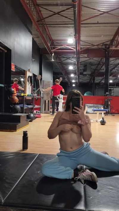 The guy in the back is too focused to notice my tits [GIF]