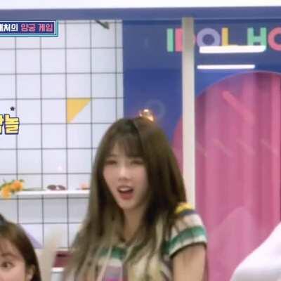 Yoohyeon breaks a board