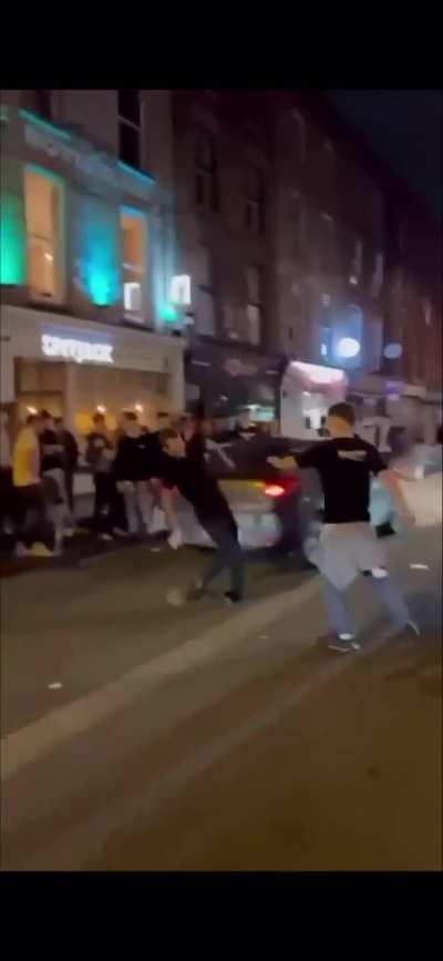 Dude vs guy vs car vs ankle. You can hear the snap.