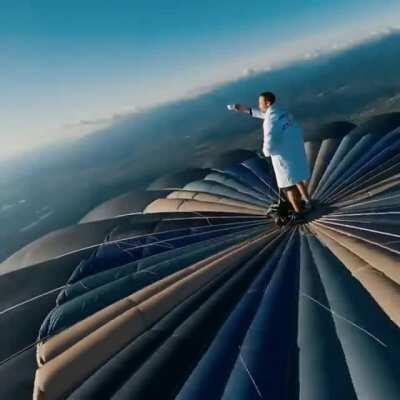 Standing on top of a hot air balloon