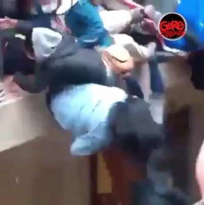 Several students killed when railing fails.