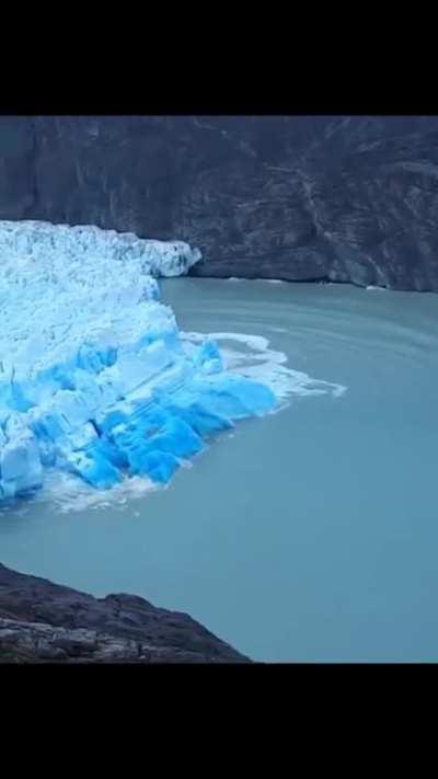 Part of a glacier flipping over