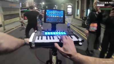 This guy went on a bike and played GTA San Andreas theme song on piano while riding