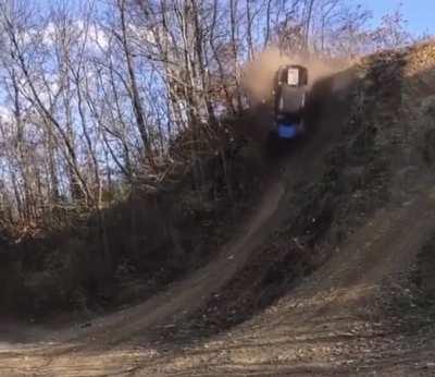 ATV going up a steep hill