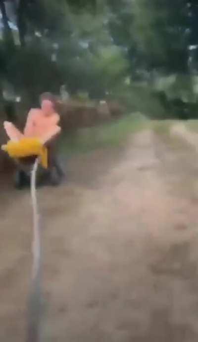 WCGW riding a toy being pulled by a truck