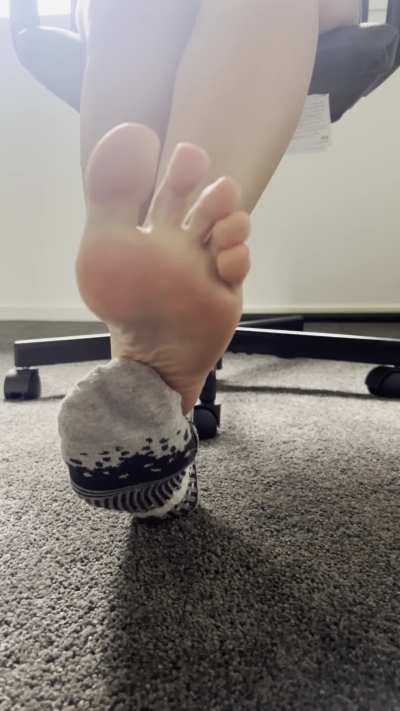 Showing my pretty toes after a long day at work