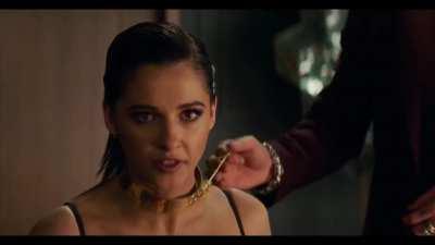 Naomi Scott collared