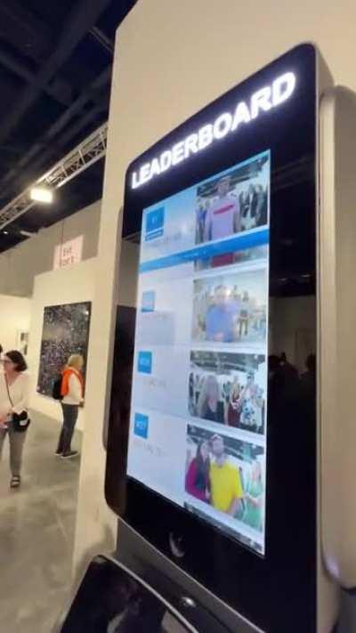 This is an ATM at Art Basel that puts your bank account balance & photo on a leaderboard for all to see