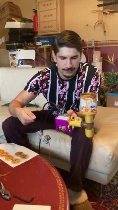 I made a piston dispenser that dispenses dulce de leche onto a shortbread cookie