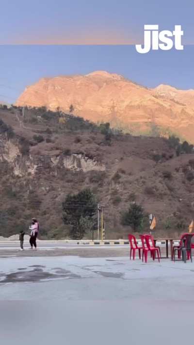 A woman was seen filming a reel while her young daughter wanders toward a busy road, she quickly rushes to retrieve her toddler.
