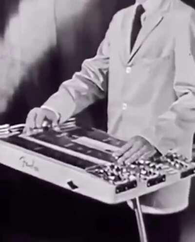Santo playing his three necked Fender steel guitar. August 1st, 1959