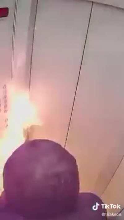 Idiot lighting drink in elevator