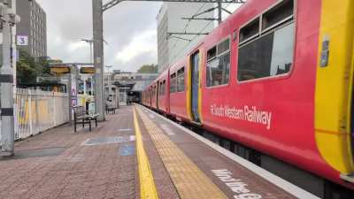 37800 drags 455718 and 455860 through Ealing Broadway on their way to Newport to be scrapped.