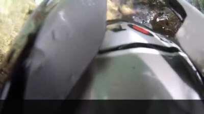 The biker made an almost fatal mistake while driving through the rocks