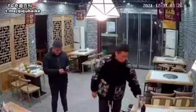 Guy casually drinking beer gets hit by a bull