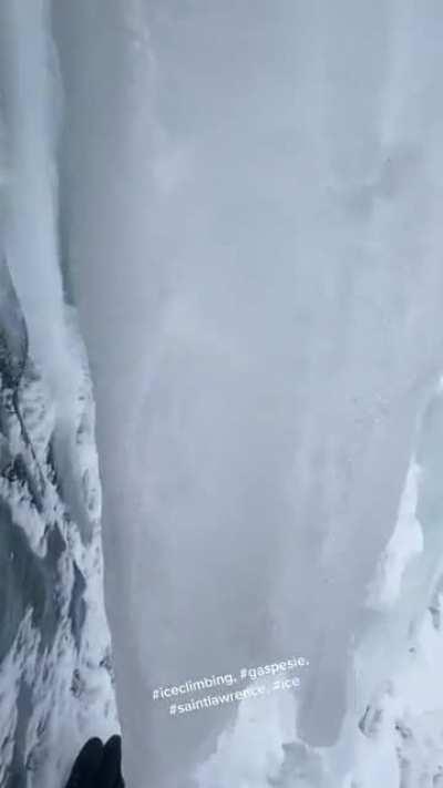 Hanging at this cliff, with the water flowing behind the ice