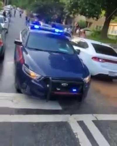 Police car gets shot by many people