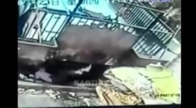 Man falls into trash compacter