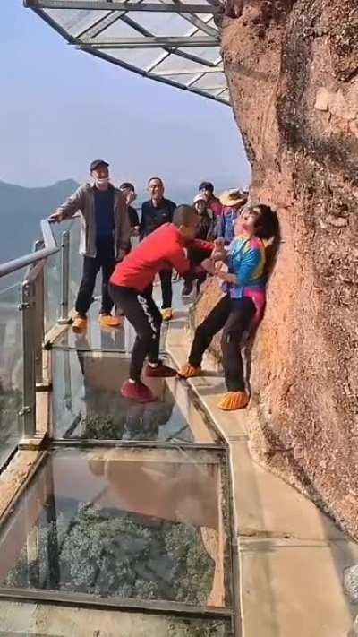 Walking on glass bridge