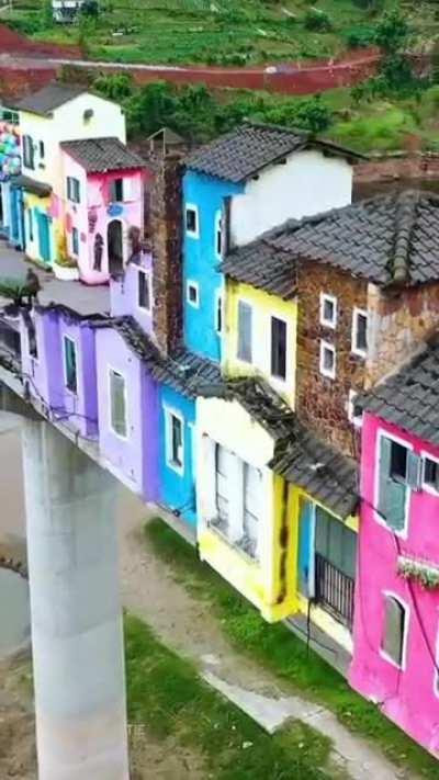 Rainbow houses built on a bridge (China)
