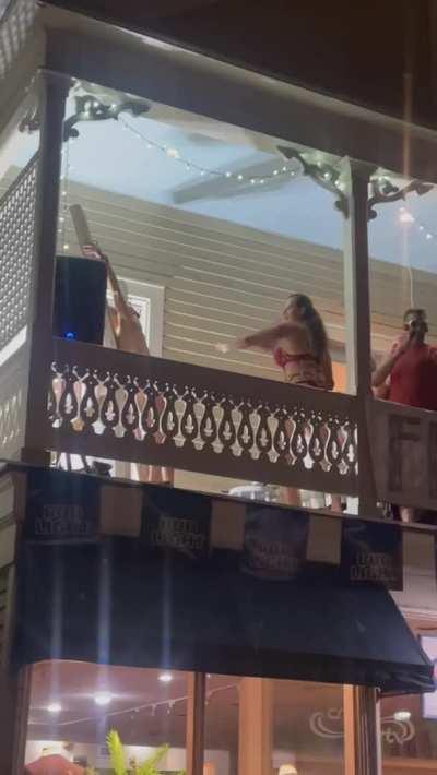 Getting flogged on a balcony at Fantasyfest