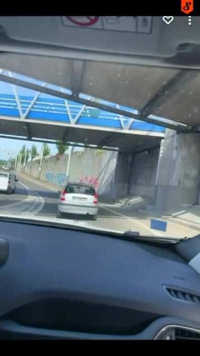 Idiot girl crashes into wall in France while taking laughing gas