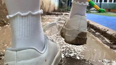 Pink uniforms playing in the mud