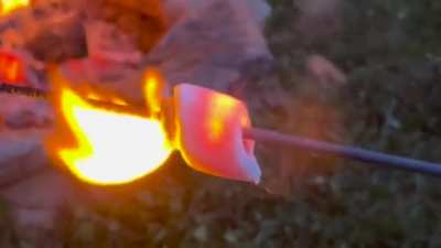 Sparkler burning through a marshmallow