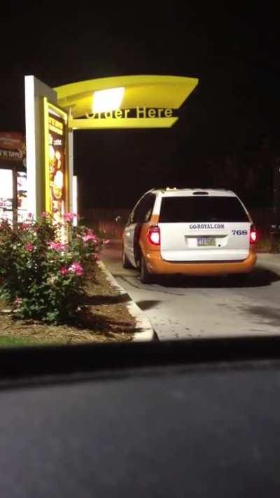 Girl using the drive thru in a different way, and also taking a tumble.