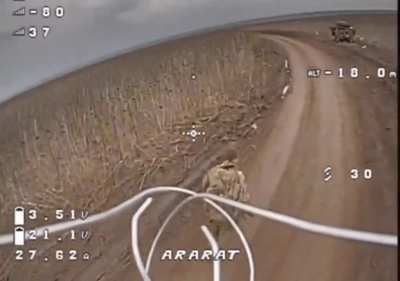 Ukrainian Fanat Group Chases Two Russian soldiers with an FPV Kamikaze Drone Before Taking One Out (Published on April 26, 2025)