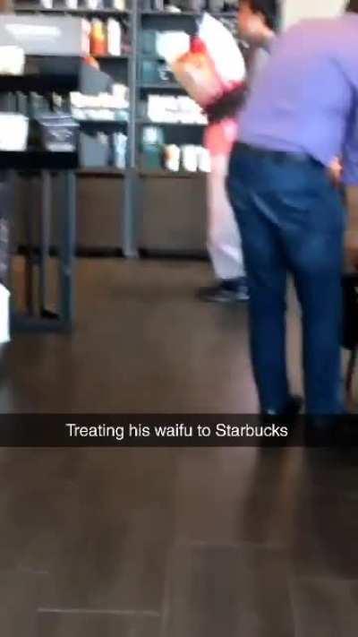 Man treats his waifu to Starbucks (this was taken a year ago)