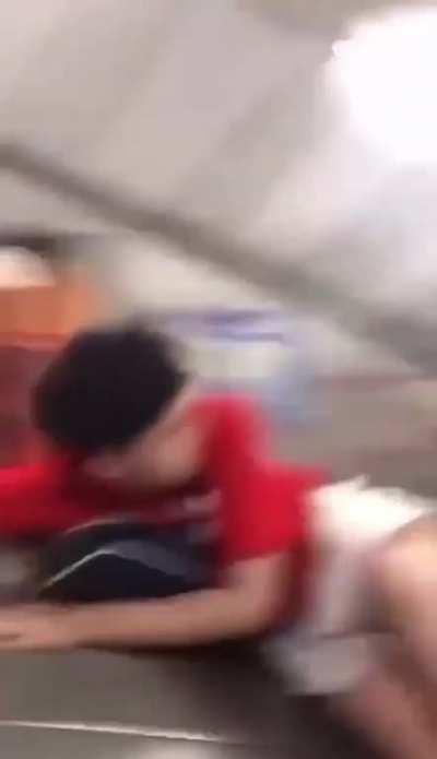 To slide down by London Underground escalator.