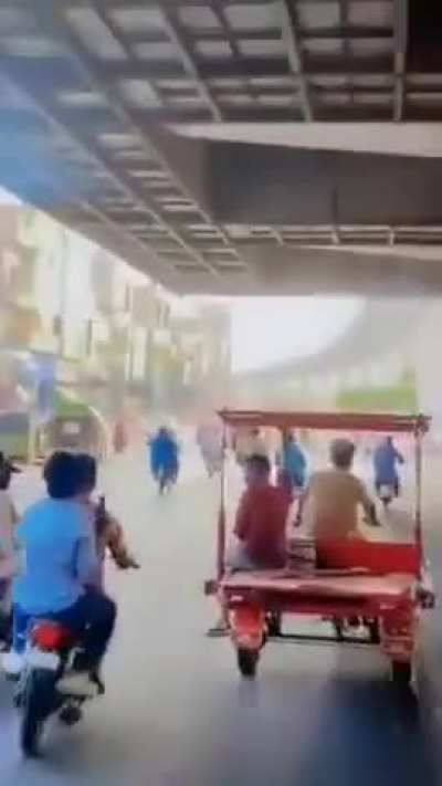 Idiots with guns on a bike