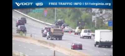 Distracted Driver Barely Misses Hitting Safety Worker But Eats Shit Anyway 