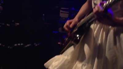 Her name is Mincho. She plays guitar. Enough said. P.3