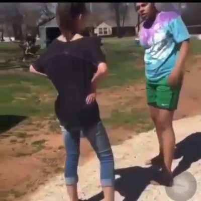 Racist girl gets beat up by another girl