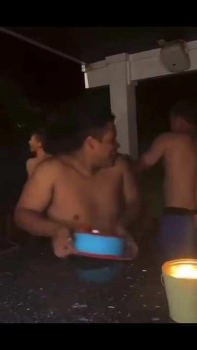 To throw cake at friend