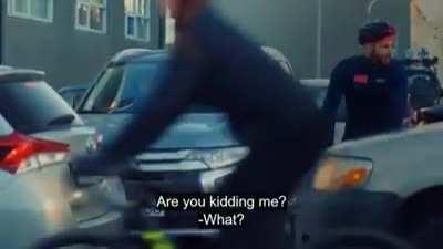 Are you kidding me? A man on a bike! Get yourself a car!