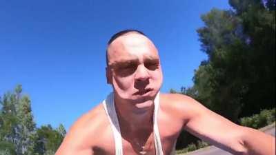 Accelerating to 300 kph (185 mph) on a motorbike with no helmet on