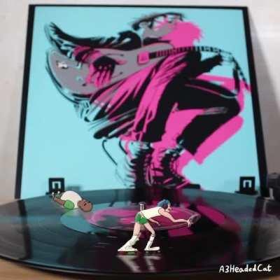 Did anyone else get a miniature version of the band with their copy of 