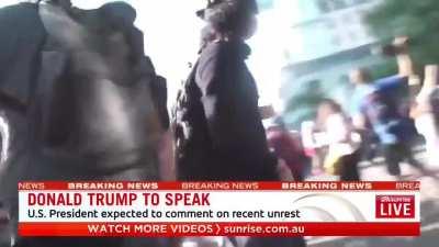 The Australian channel broadcasting live in front of the White House punched cameraman by police. Broadcast was interrupted.