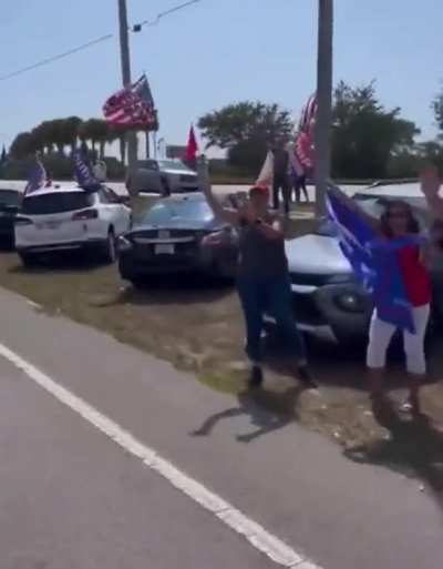 Trump's MAGA cult cheers for their Orange Messiah on his way to court in New York