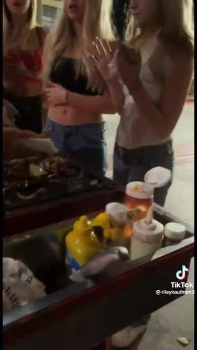 Hispanic street vendor outside SDSU harassed by a group girls: the vendor had refused to lower his price when asked by the four women, which led to them touching, eating, and throwing his food.