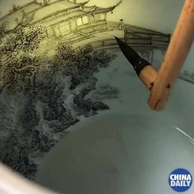 Paintbrush for painting inside of bowls