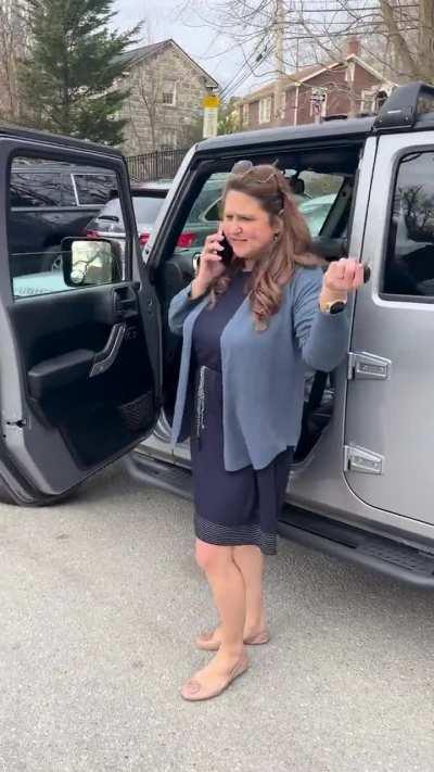 Karen in Ellicott City Maryland backs into tow truck, no damage, then flips out on driver and passenger. Tells passenger they are a  “Liberal POS” THEN swings at passenger, then leaves once she realizes jail time is on the way.