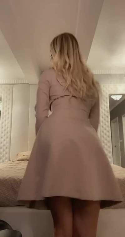 Being sexy and naughty while undoing a coat