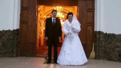 A cat crashes a wedding in Ukraine to get his share of the traditional candy toss