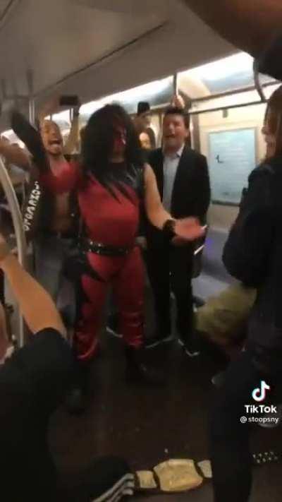 Kane, Stone Cold Steve Austin, and Triple H dancing to 6ix9ine on the NYC subway.