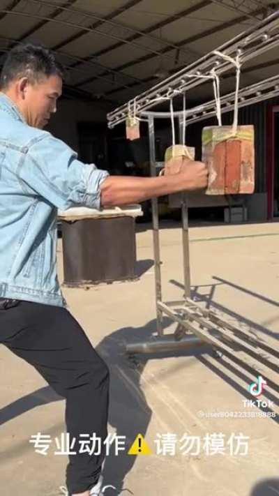 The force applied at point blank range to break those bicks