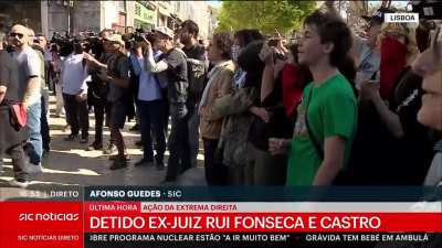 Far-right group member sneaks into counterprotesting left-wing crowd to attack them from behind and set off clashes during protests on Portugal's Revolution Day